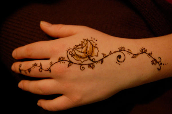 Flowered vine on hand | Flower Tattoo