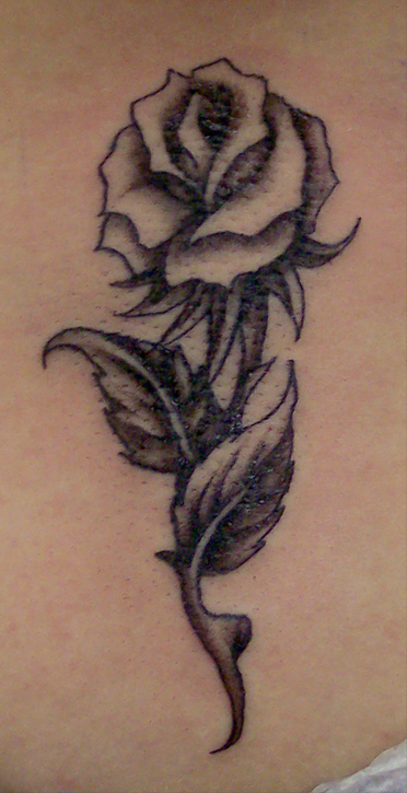 lower back rose - flower tattoo