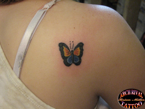 small butterfly tattoo by