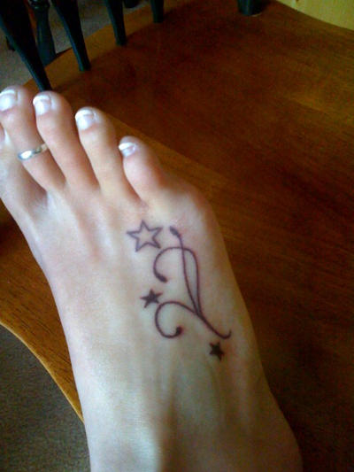 Women Tattoos With Image Foot Star Tattoo Designs