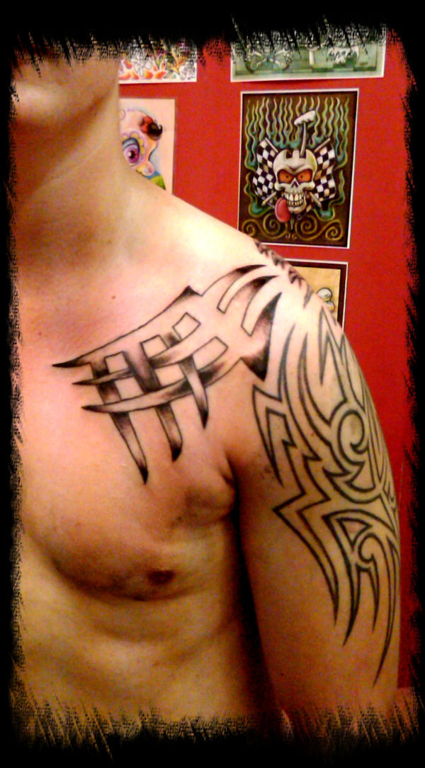 tribal chest - chest tattoo