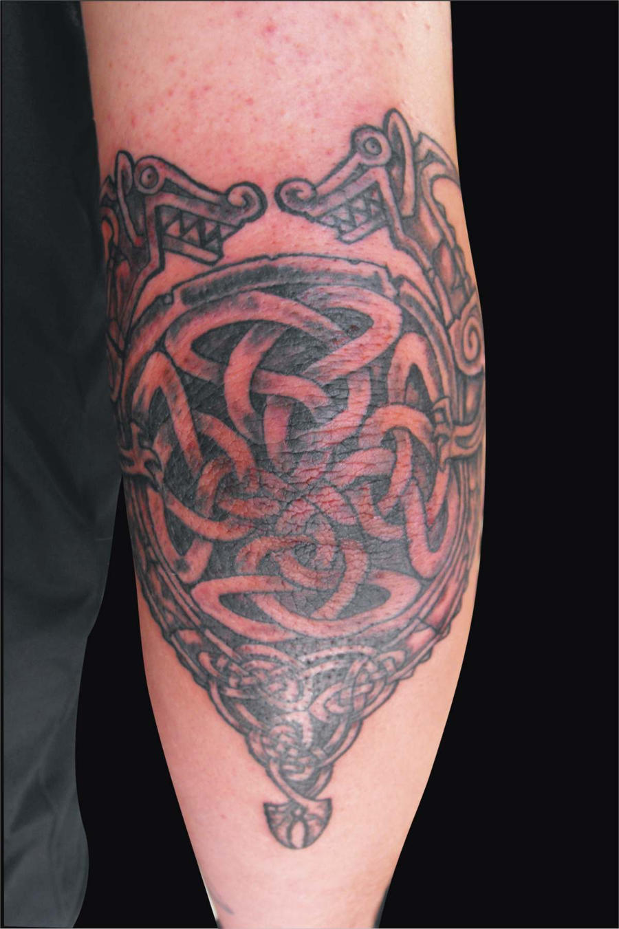 celtic elbow tattoo by