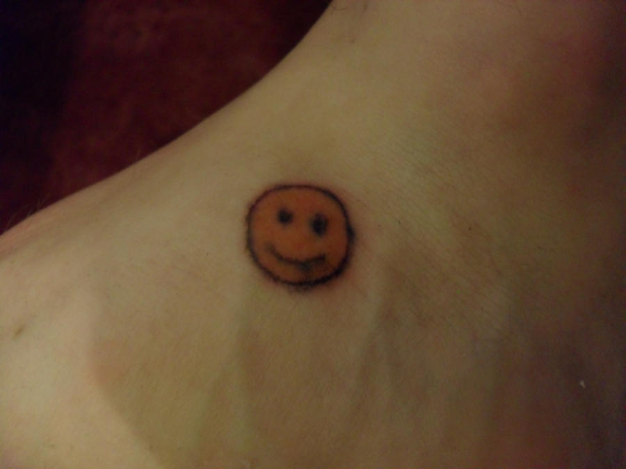 smiley tattoo by moowie23 on