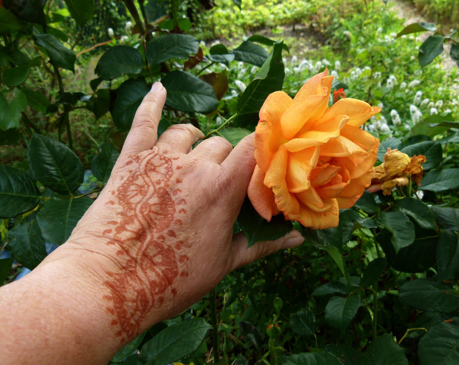 Henna tattoo hand design by