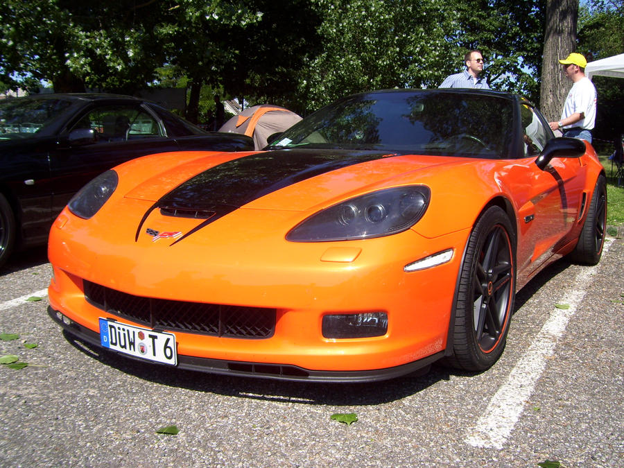 [Bild: Chevrolet_Corvette_C6_orange_by_psykomysik.jpg]